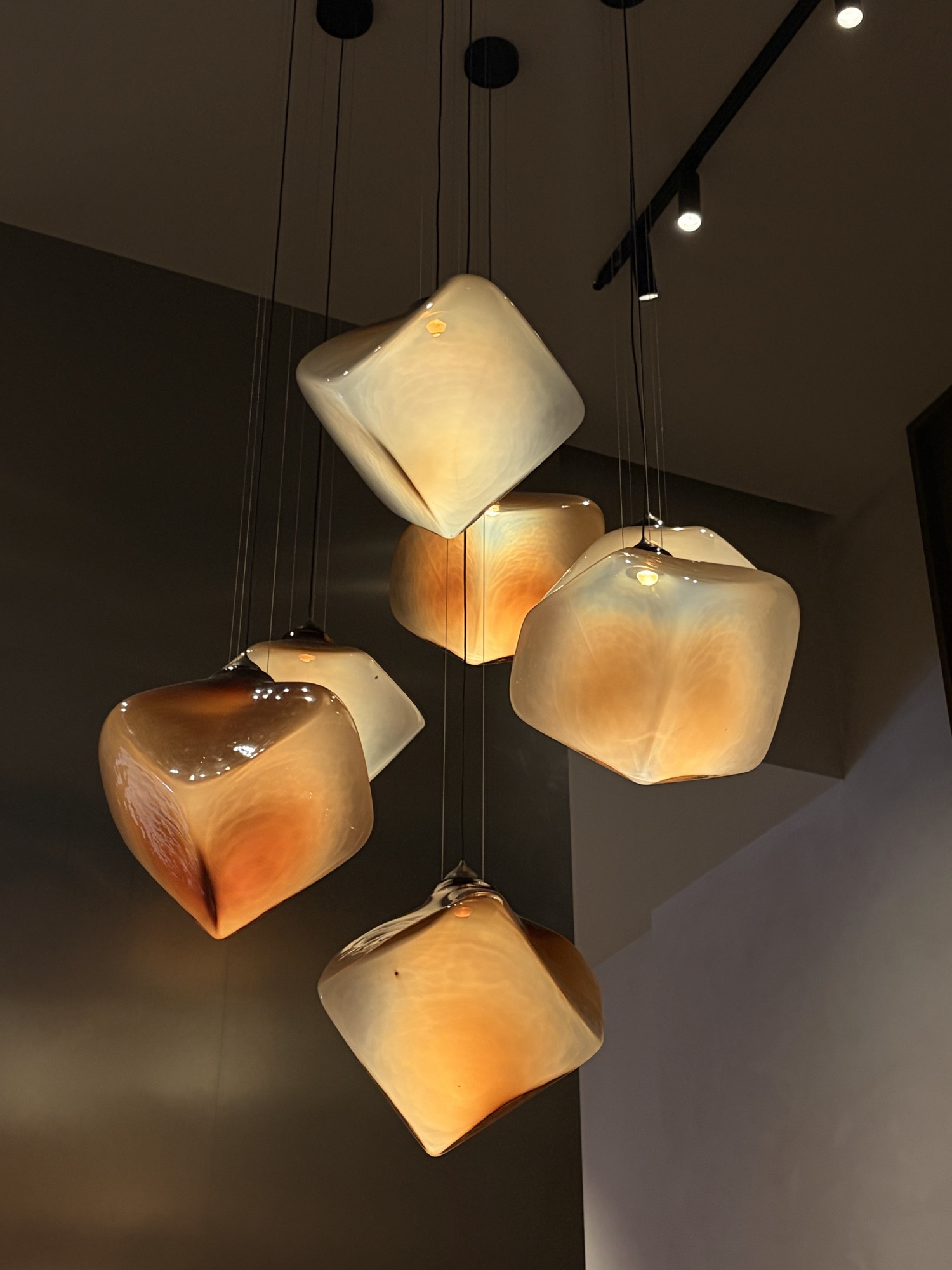 Cluster of hand-blown glass pendant lamps